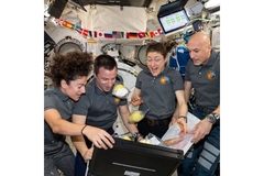 Image Four astronauts.